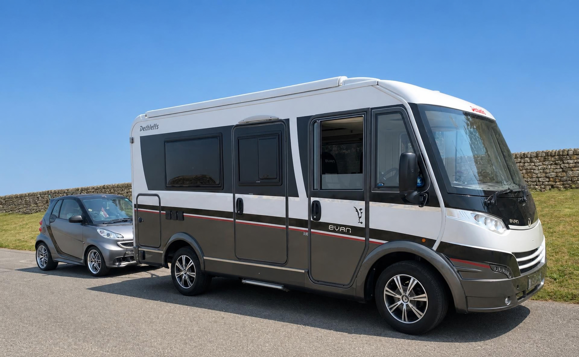 TowGlide A-frame towing a Smart car behind a motorhome
