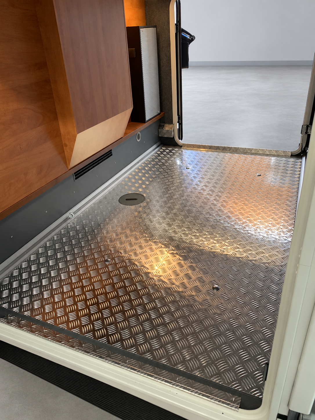 Illustrative example of chequer plate garage flooring