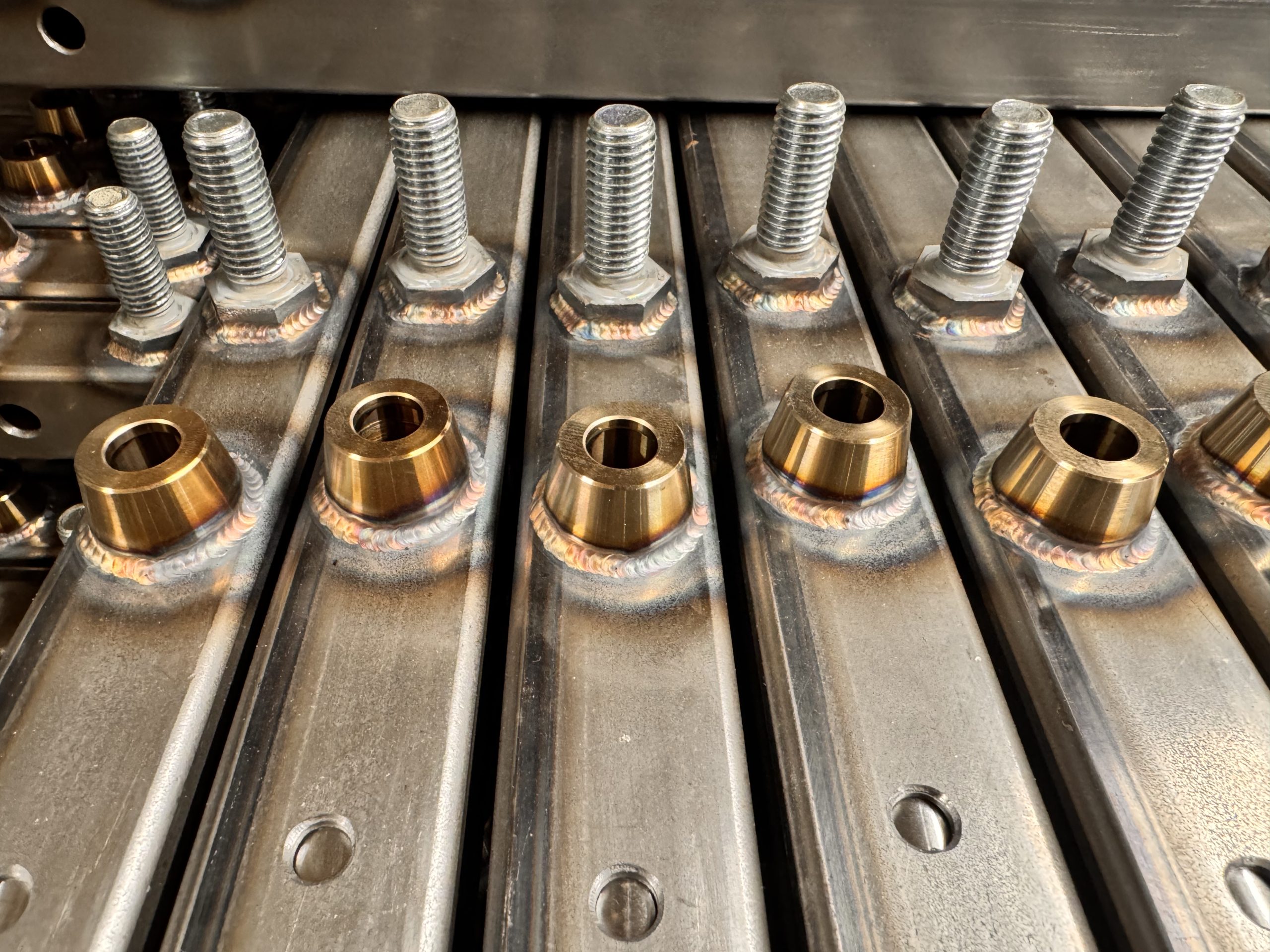 Close-up of fabricated TowGlide components and bushes